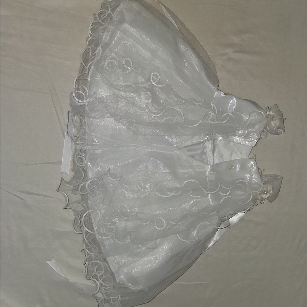 Elegant White Dress with Swirl Details